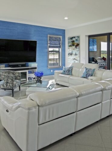 Contemporary Interior Design, Bright Blue Natural Grass wallcoverings, Roman Shades with Color Coordinated Fabric