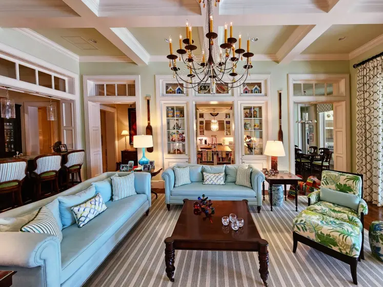 Coastal Family Room in Aqua and Green with Custom Drapery and Striped Area Rug | PaperWorks Plus, Jupiter FL