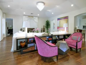Pink velvet Schumacher upholstery on armchairs, custom fabrics by PaperWorks Plus