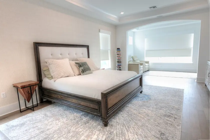 Motorized Double Roller Shades in a Master Bedroom | PaperWorks Plus, Jupiter FL