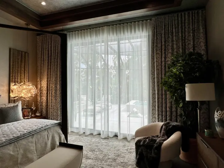 Sheer Floor-to-Ceiling Draperies with Patterned Side Panels in a Master Bedroom | PaperWorks Plus, Jupiter FL