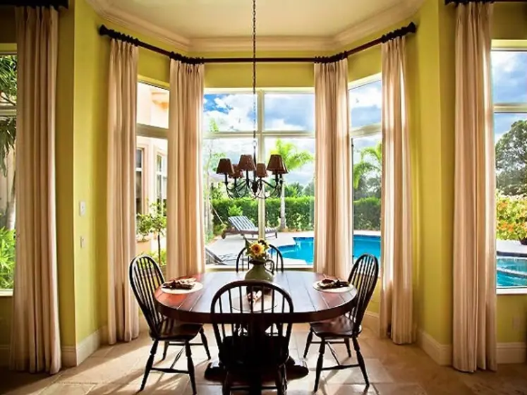 Pinch-Pleated Linen Drapery Panels on Dark Wood Drapery Hardware | PaperWorks Plus, Jupiter FL