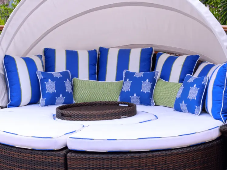 Seat Cushions with Welt of Contrasting Fabric and Colorful Pillows for Outdoor Area made with Sunbrella by Thibaut | PaperWorks Plus, Jupiter FL
